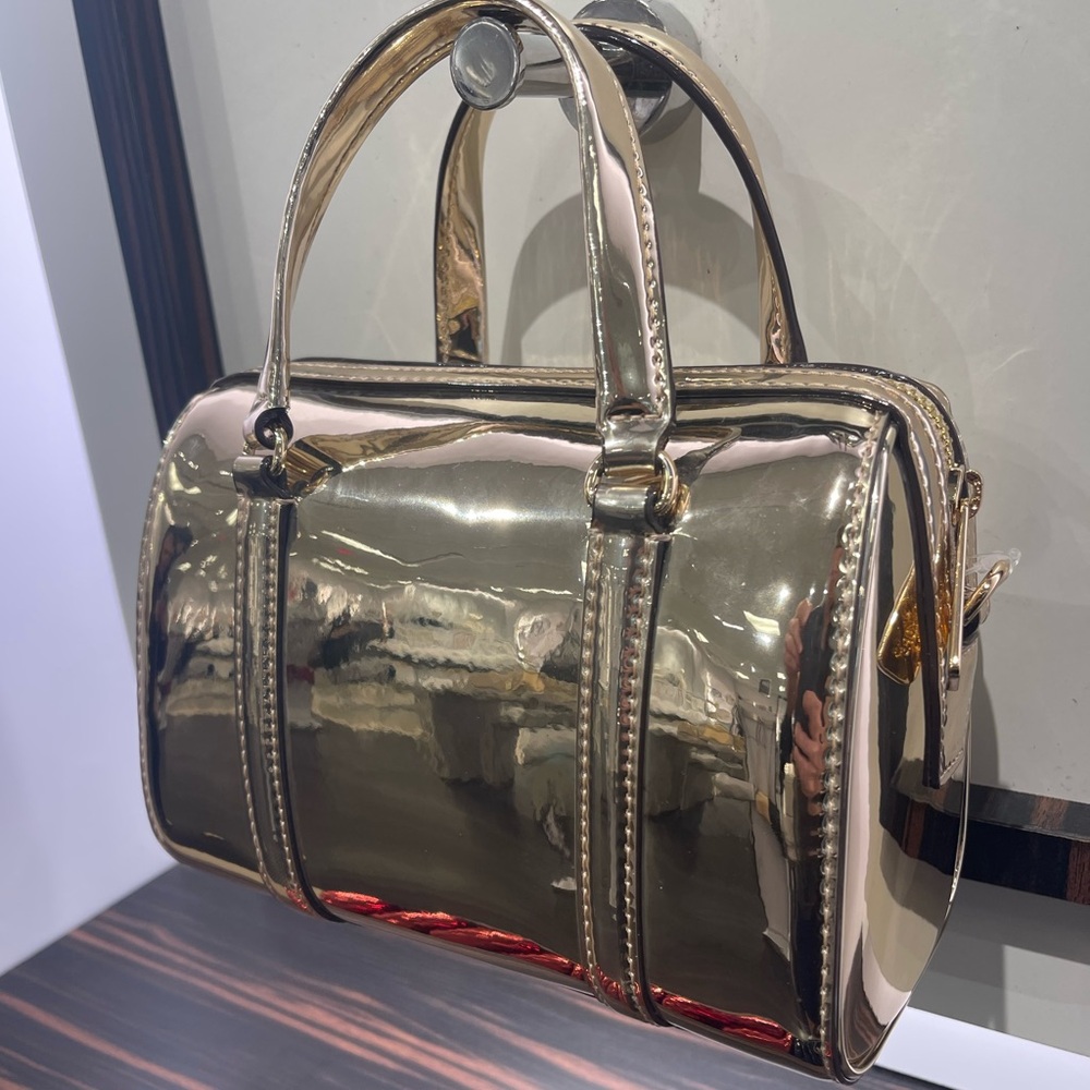MICHAEL KORS Jet Set Small Metallic Convertible Crossbody Duffle Xbody
Pale Gold - Picture 16 of 16